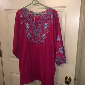Pink blouse with blue embroidered detail